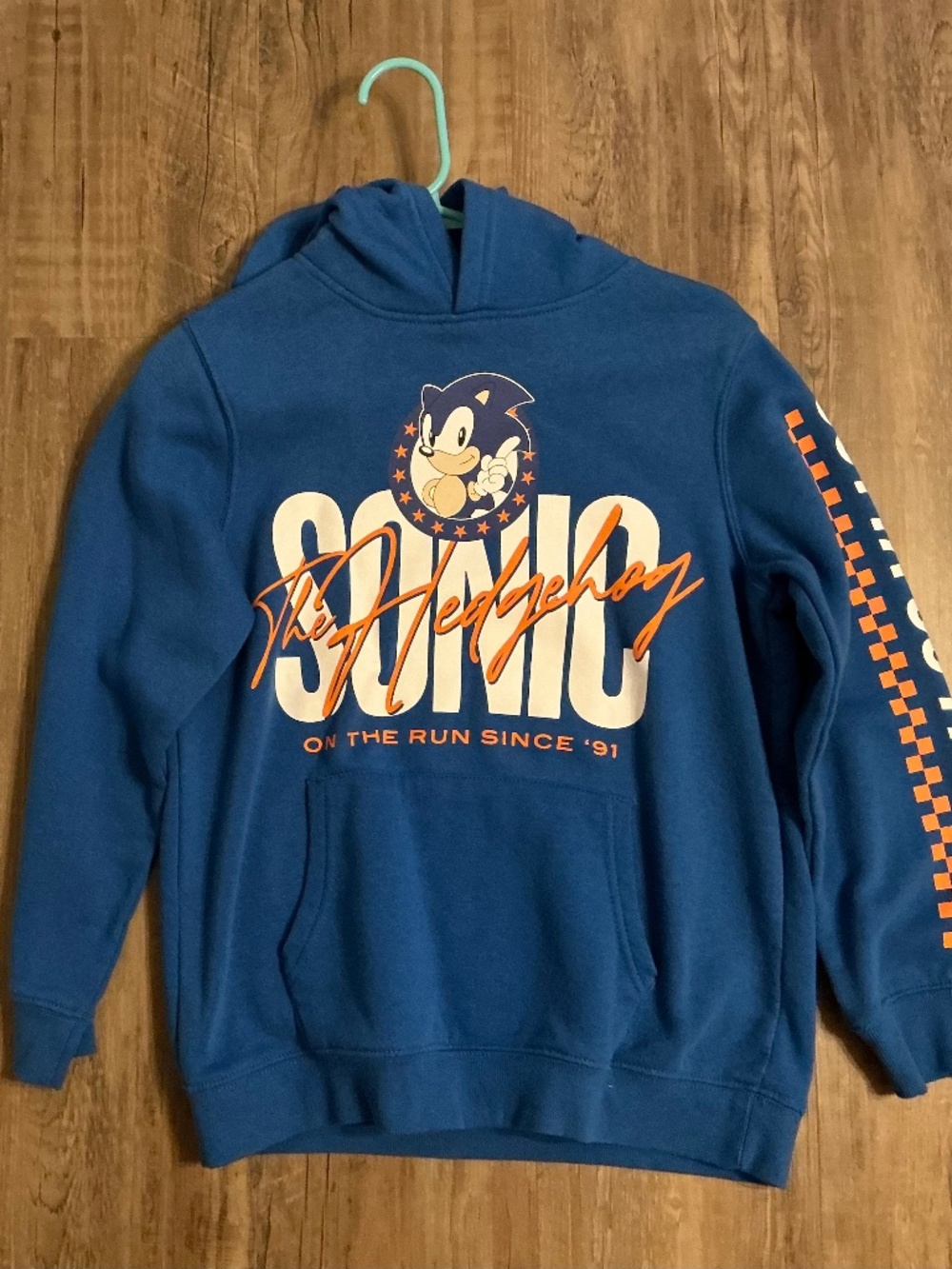 SEGA Sonic the Hedgehog "On the Run Since '91" pullover hoodie, size L (youth) - Picture 1 of 3